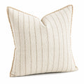 Cuscino decorativo 45 x 45 cm in tessuto beige a righe con frange